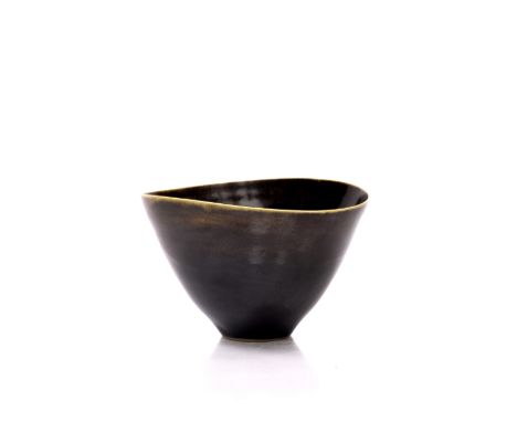 Lucie Rie (1902-1995) Bowl elliptical form, manganese glaze with yellow rim impressed potter's seal 10.7cm high, 17.6cm diame