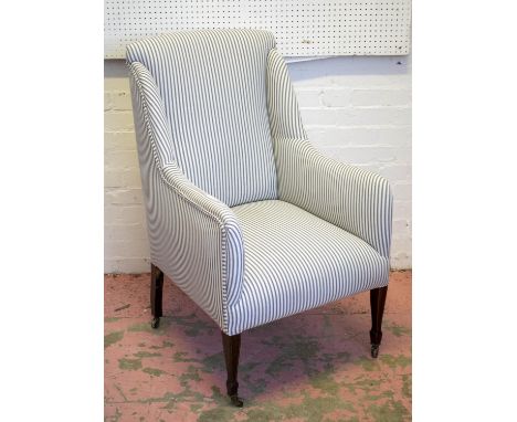 WING ARMCHAIR, 101cm H x 62cm W, Edwardian mahogany and boxwood strung in ticking upholstery with ceramic castors. 