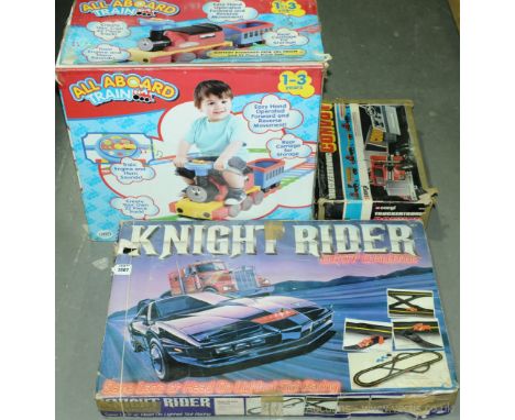 A mixed group to include Corgi Truckertronic Convoy, Knight Rider Slot Racing Set &amp; All Aboard Push Along Train. All unch