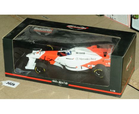 Pauls Model Art (Minichamps) a boxed 1/18 scale 530 961808 McLaren Mercedes MP 4/11 'D. Coulthard'. Conditions generally appe