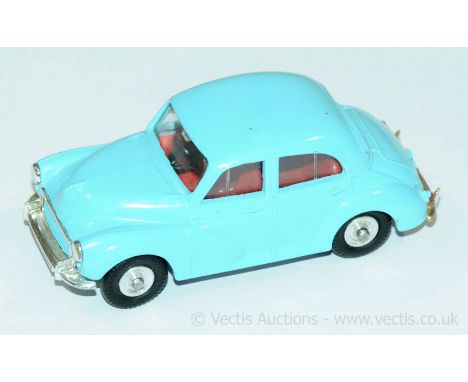 Spot On No.289 an unboxed Morris Minor 1000 in light blue, red interior and black steering wheel along chrome spun hubs. Cond