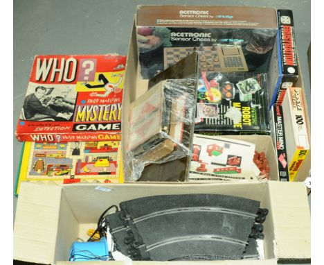 A mixed group to include Scalextric Track, 1930's and 1940's Vintage Monopoly games, Acetronic Sensor Electronic Chess game, 