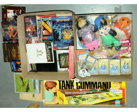 A large mixed group comprising of boxed games, soft toys, sticker albums, war gaming, small coin collection and other interes