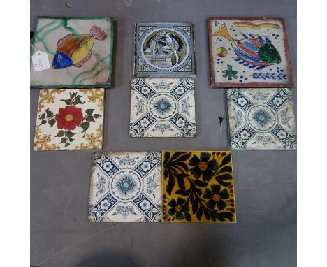 A collection of eight tiles, two include two large tiles decorated with fish, 20 x 20cm, a Minton's tile depicting Romeo and 