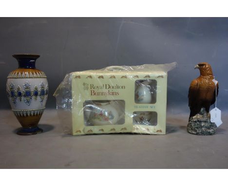 A Beswick Golden eagle decanter by John G Tongue, H.27cm, together with a boxed Royal Doulton bunnykins set and a Doulton sto