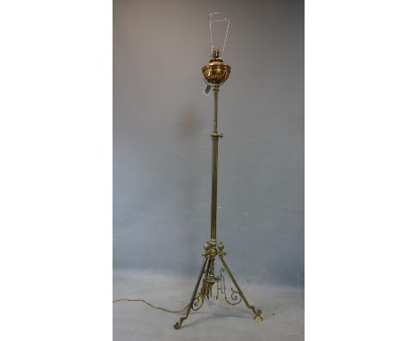 A Victorian brass telescopic oil lamp converted to electricity, missing one foot 