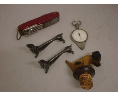 MIXED LOT PENKNIFE PAIR OF DOG KNIFE RESTS DOG BOTTLE STOPPER AND MAP MEASURING TOOL