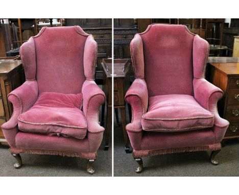 A Pair of Queen Anne Style Wing Back Armchairs, first half 20th century, raspberry upholstery on walnut cabriole supports (2)