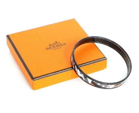 Hermés Enamel Bangle printed in white, grey, black and orange, velvet pouch, original box, 7cm diameter
