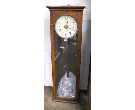 An Oak Cased National Time Recorder Electric Master Clock, 42cm by 22cm by 132cm