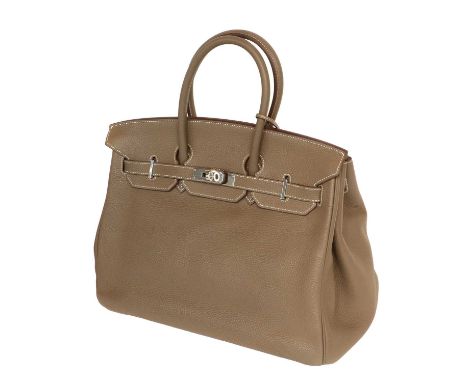 A Circa 2007 Hermés Taupe Leather Birkin Bag, with palladium hard ware, detachable keys in leather case, padlock, white stitc