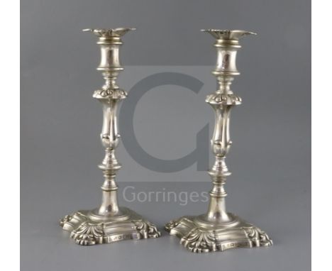 A pair of early Victorian silver candlesticks, by Henry Wilkinson &amp; Co, with waisted, knopped stems, on shaped square bas