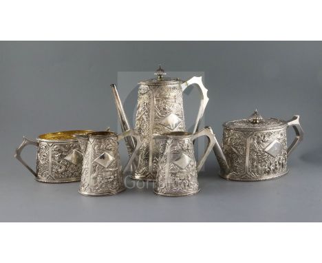 A good early 20th century Chinese Export silver five piece tea and coffee service, by Wang Hing, Hong Kong, of oval form, com