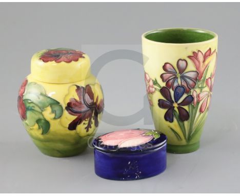 A Moorcroft 'spring flowers' vase, a 'hibiscus' jar and cover and a 'magnolia' trinket box and cover, 1970's, various impress