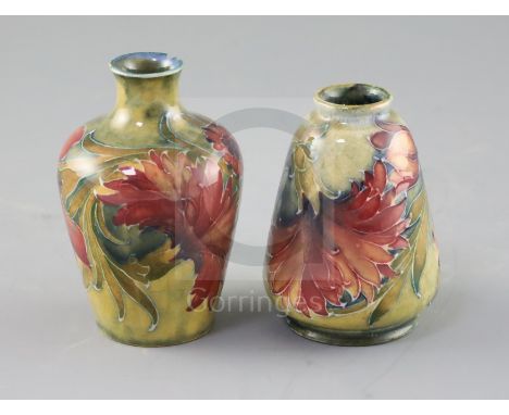 Two Moorcroft 'Spanish' pattern miniature vases, c.1910-18, the first of conical form, the second of baluster shape, both wit