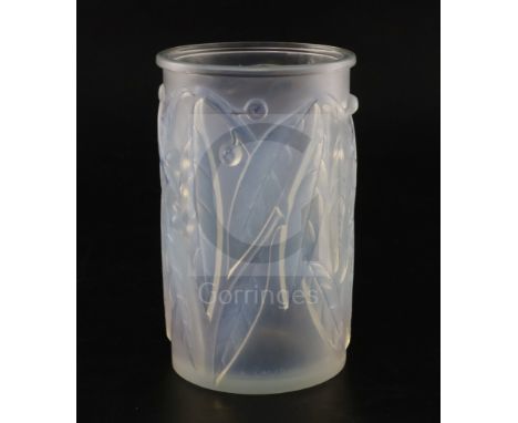 A Rene Lalique 'Laurier' clear and opalescent glass vase, No. 947, incised mark to edge 'R. LALIQUE FRANCE', H. 17.5cm