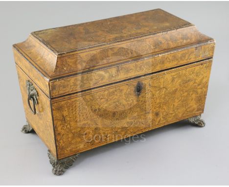 A Regency penwork sarcophagus tea caddy, decorated with exotic flowers, the interior with two canisters and lacking mixing bo