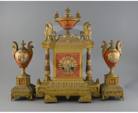 A 19th century French ormolu and porcelain classical revival clock garniture, decorated with griffins and painted with a clas