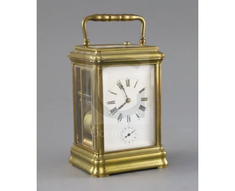 An early 20th century French hour repeating carriage alarum clock, with enamelled Roman dial, Grand Sonnerie / silence / Peti