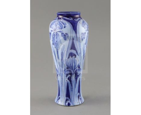 A Moorcroft Florian ware 'Iris' vase, c.1900, of tall baluster form, decorated in blue and white tones, brown printed Florian