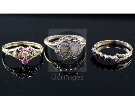 Three assorted Georgian gold and gem set dress rings including 15ct gold and a 'Regard' ring.