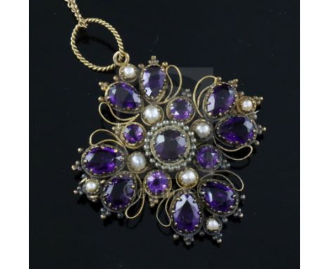 A Victorian gold, amethyst and split pearl set quatrefoil pendant, on a 9ct gold fine link chain, pendant 42mm.
