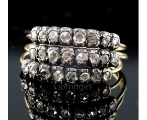 A 19th century gold and rose cut diamond set triple shank half hoop ring, each shank set with eight graduated rose cut diamon