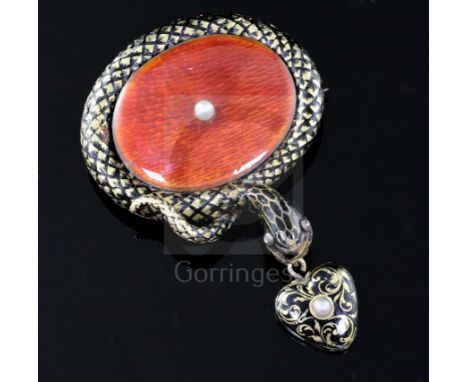 A Victorian gold, two colour enamel and seed pearl set serpent drop brooch, the heart shaped drop with glazed back, overall d