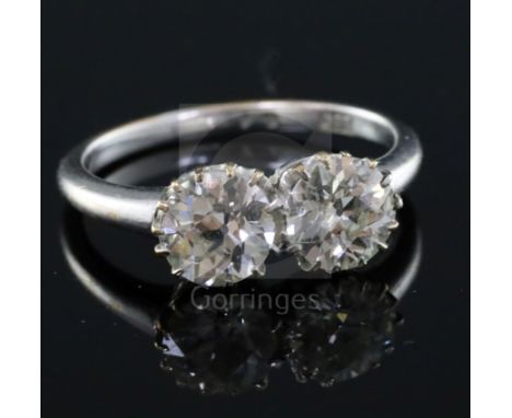 An 18ct white gold and two stone diamond ring, each stone weighing approximately 1.00ct, size P/Q.