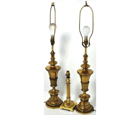 A pair of classical urn shaped brass lamps and a brass column table lamp (3).