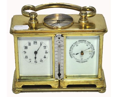 An early 20th century brass weather station carriage clock, inset compass to top, central thermometer flanked by enamel dial 