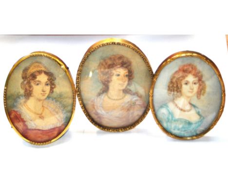 UNATTRIBUTED; three watercolour portrait miniatures, all depicting young ladies in dress, the largest measuring 10 x 8cm, all