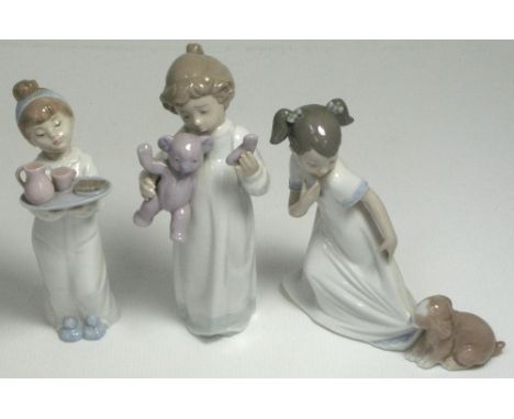 Three Nao figurines; "Let Me Go", 18cm, "Poor Teddy", 20cm and another figurine of a girl holding a tray, all with original b