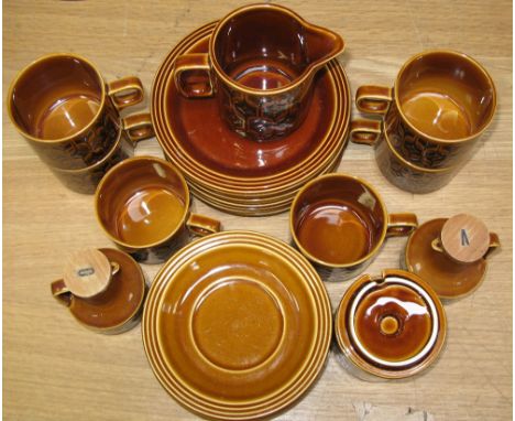 A retro Hornsea part tea service with oil and vinegar bottles.