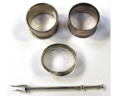 A hallmarked silver pickle fork, three hallmarked silver napkin rings, (one af), various dates, approx weight 1.2ozt (4).