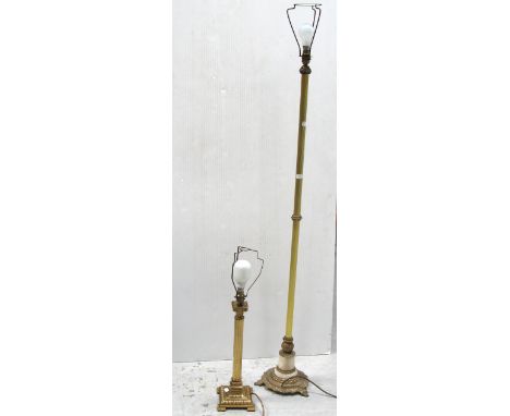 A brass column standard lamp on a fancy metal base and a matching brass  column table lamp (2).