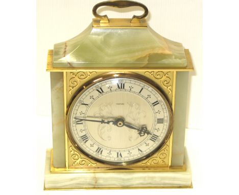 A modern onyx and brass Tempura mantel clock.