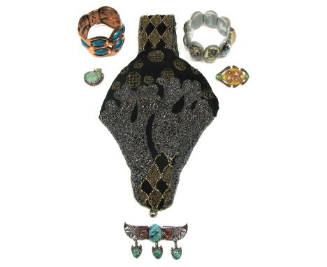 A c.1920s Neo Egyptian style white metal and turquoise colour stone brooch in the form of scarabs, a copper and turquoise ena