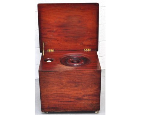 A late 19th century mahogany commode with original bowl (af), the bowl inscribed "R.Wiss" patent London, with carrying handle