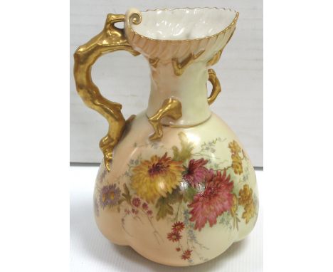 A Royal Worcester blush ivory jug, hand painted with chrysanthemums and daisies with gilded stylised handle in the form of co