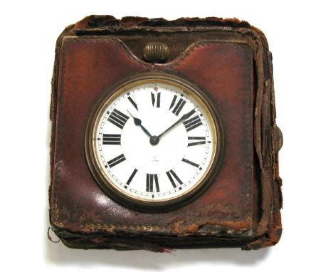 A large open face time piece, the white enamel dial set with Roman numerals and contained within original leather case, diame