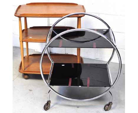 A retro light oak Ercol three tier trolley and another retro chromed example (2).