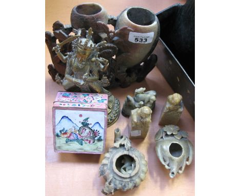 An Oriental collectors lot to include soapstone carvings, an Indian brass goddess figurine, papier mâché letter rack and box 