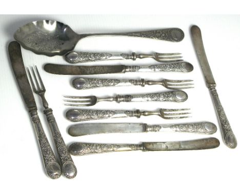 A set of five George VII hallmarked silver handle dessert knives and forks and a white metal dessert spoon, Sheffield 1902.