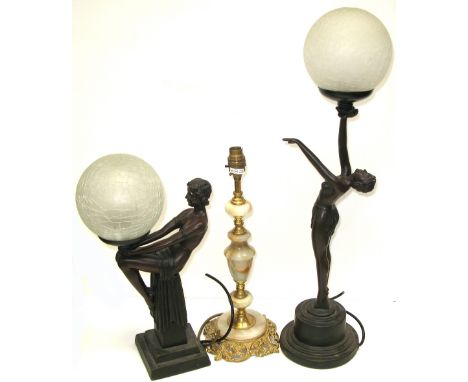 Three table lamps to include two Art Deco figural lamps and one onyx and gilded example (3).