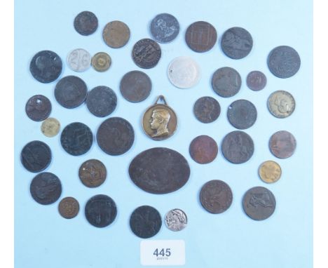 A miscellaneous collection of tokens and medallions including: Joan of Arc, Wellington Penny token, John Wilkinson Iron 1792 