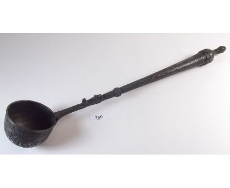 A large Eastern metal soup ladle - 50cm