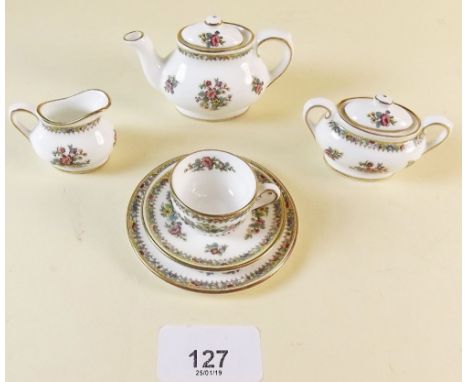 A miniature Coalport 'Ming Rose' part tea service