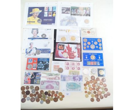 A miscellaneous group of first day covers with coins, plus coin replicas Westminster Mint, tin of coins and sets Farewell to 