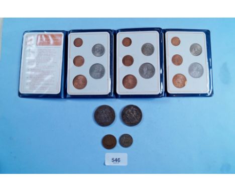 A quantity of coins including three sets of Britains First Decimal Coins complete, plus George III crown 1818 LVIII, George I